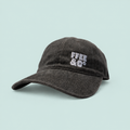 Ffee & Co washed black cap front view with embroidered logo