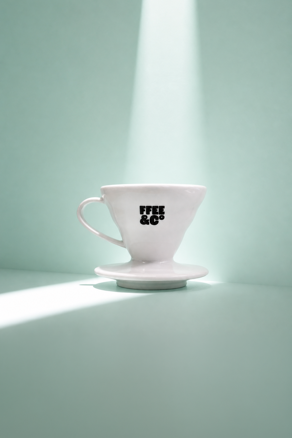 White V60 with Ffee & Co branding on a light green background